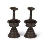 A pair of 17th century style pewter pricket candlesticks, h.