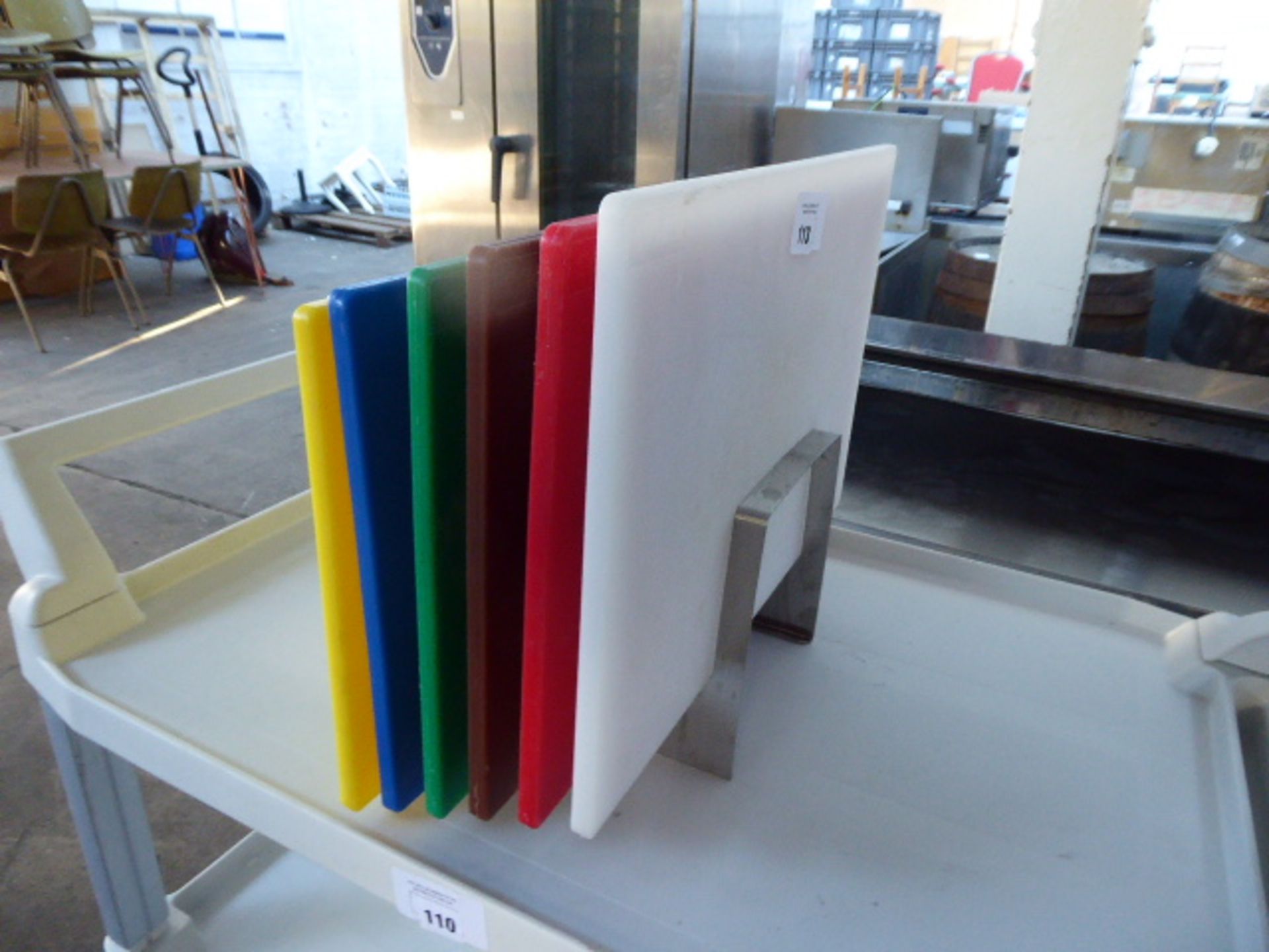 Rack containing 6 colour coded chopping boards