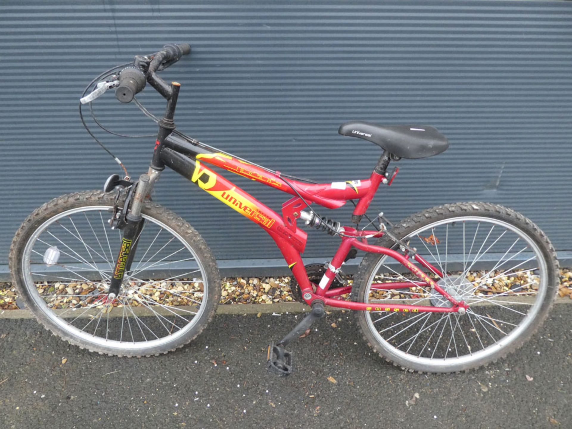 Red and yellow universal childs mountain bike