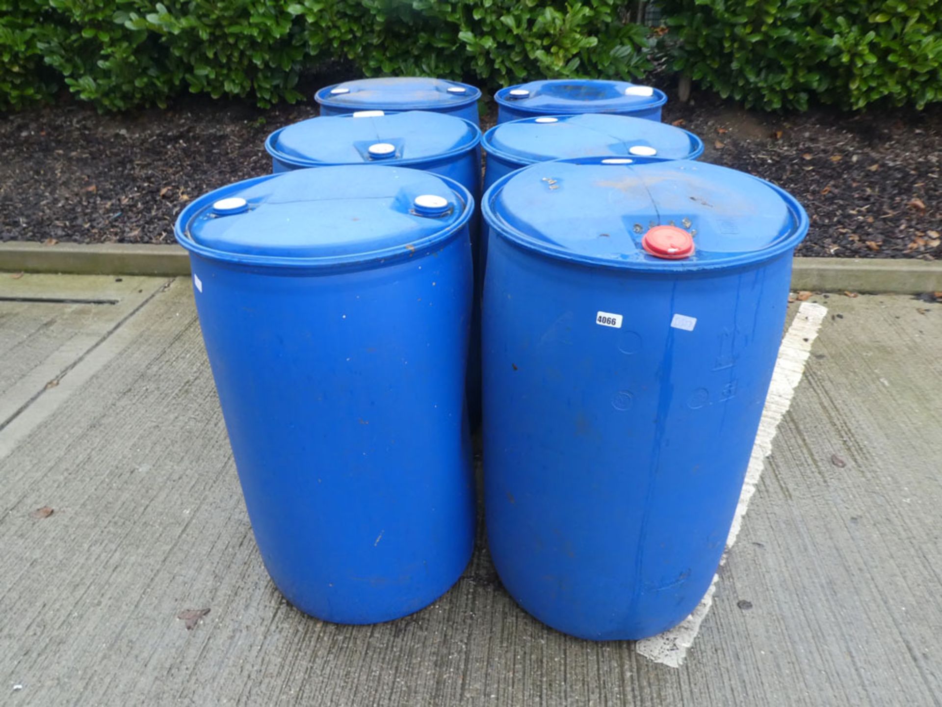 6 plastic barrels