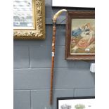 Walking stick with carved horn handle