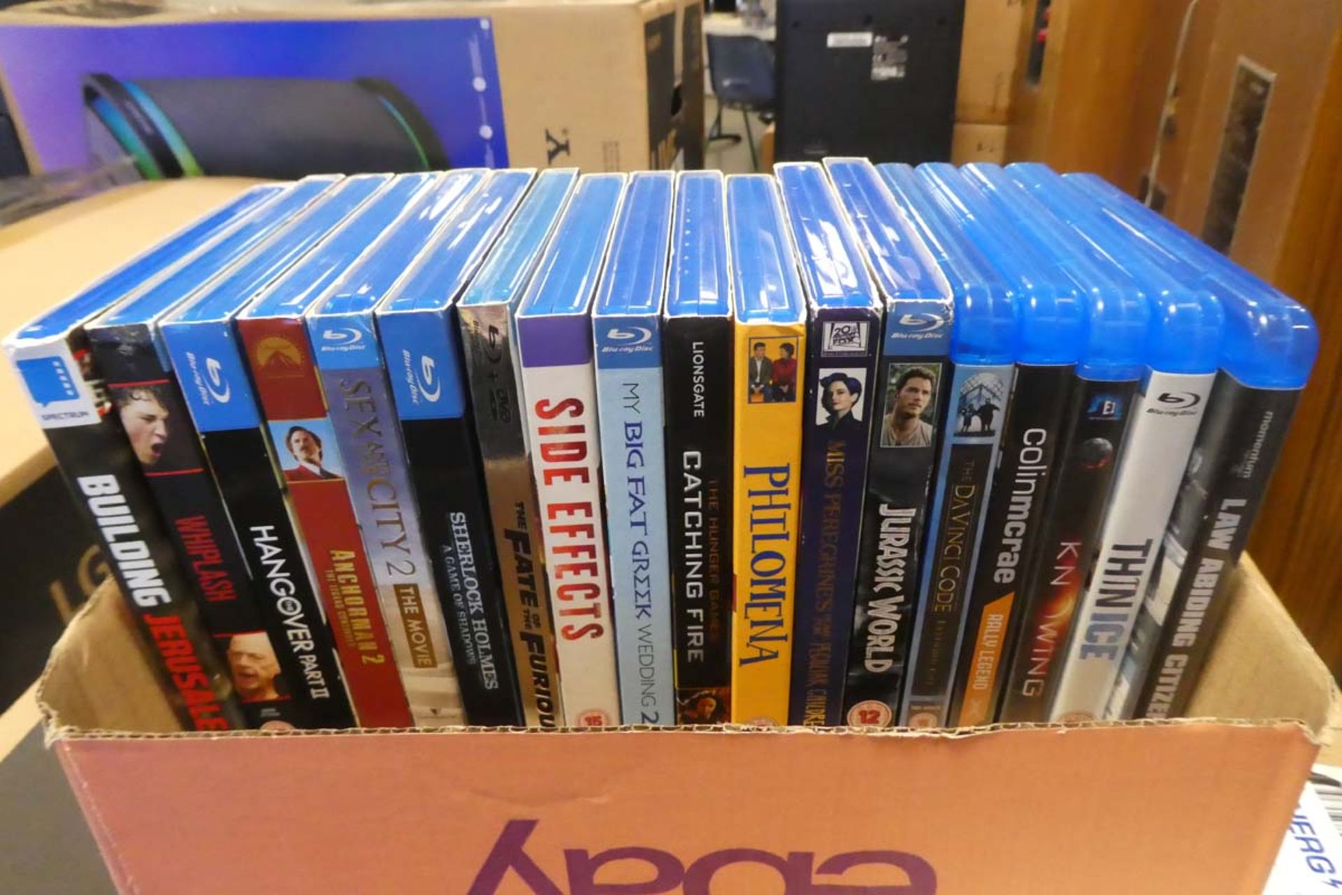 Tray containing a selection of blu-ray movies etc