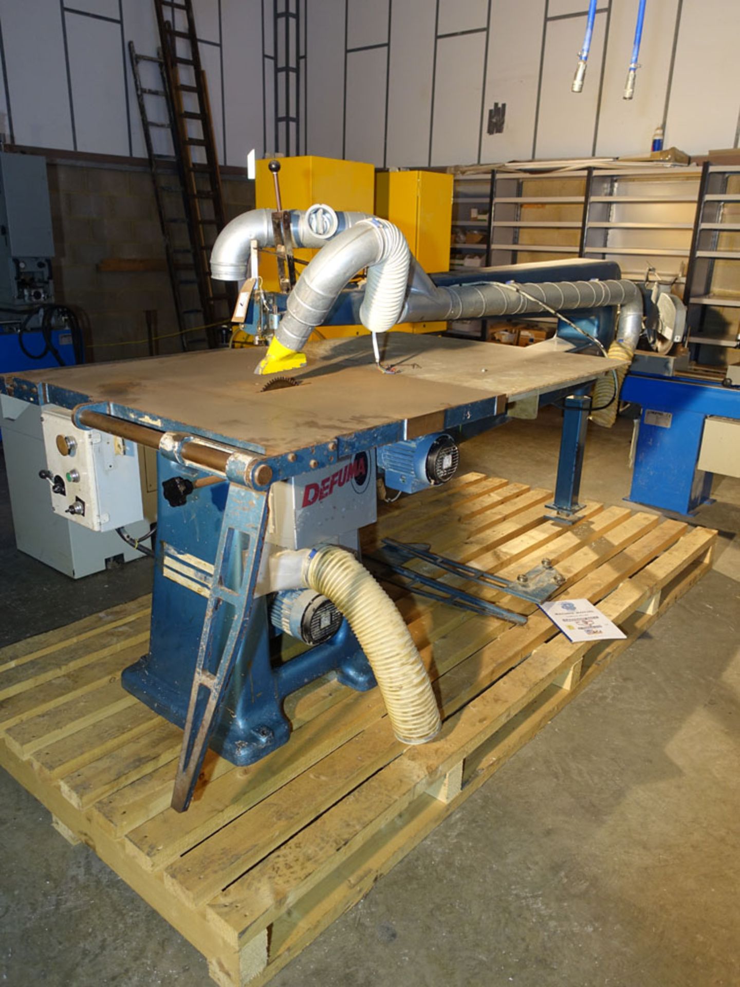 Circular saw table with deep throat fitted with Defuma extraction, throat depth approximately 2m