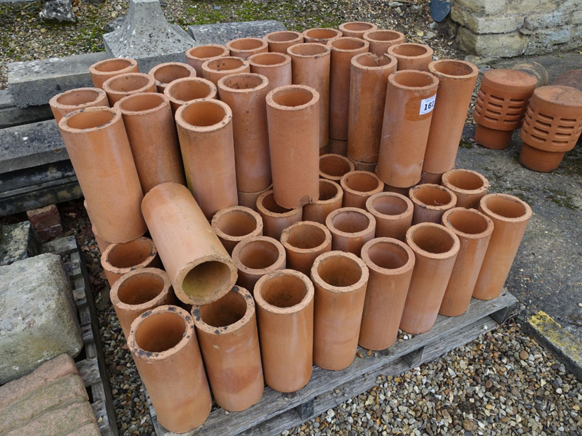 Pallet of terracotta lands drains