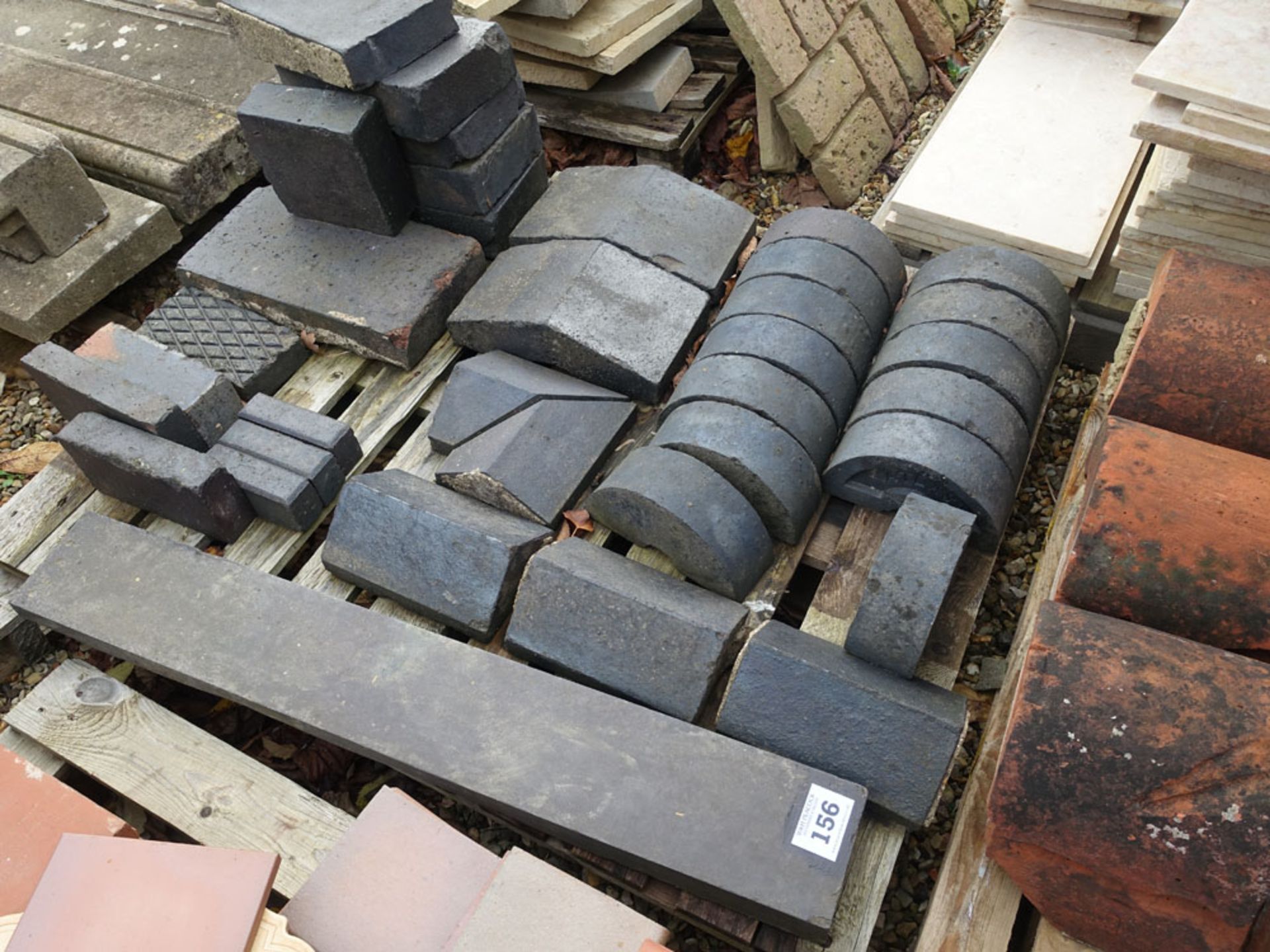 Pallet of reclaimed Staffordshire blue wall coping bricks together with 9 terracotta coping bricks