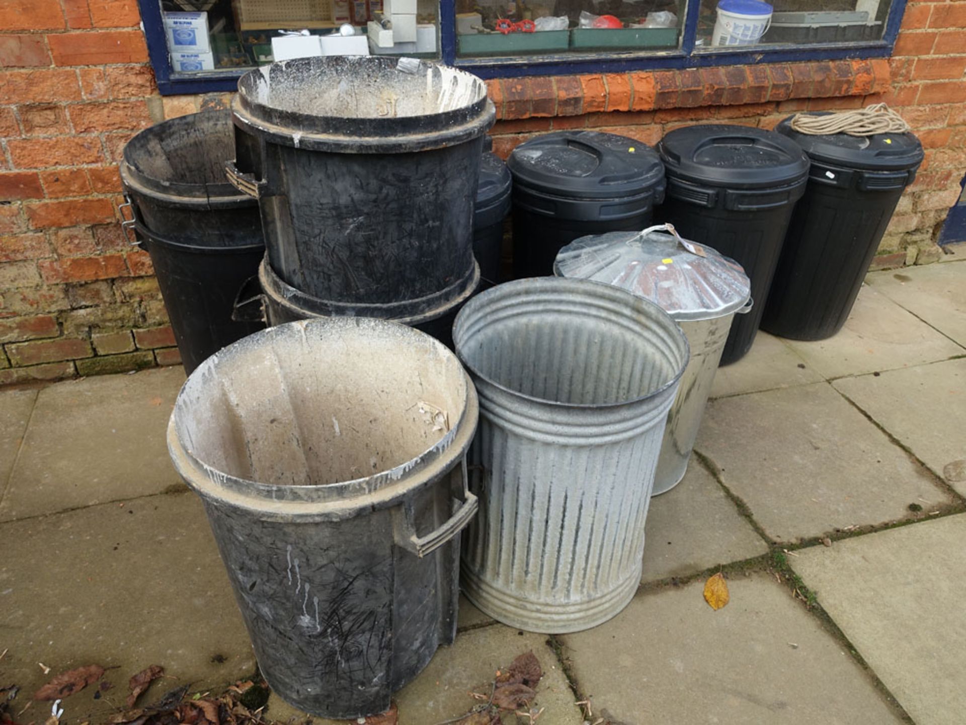 11 various galvanized and plastic dust bins