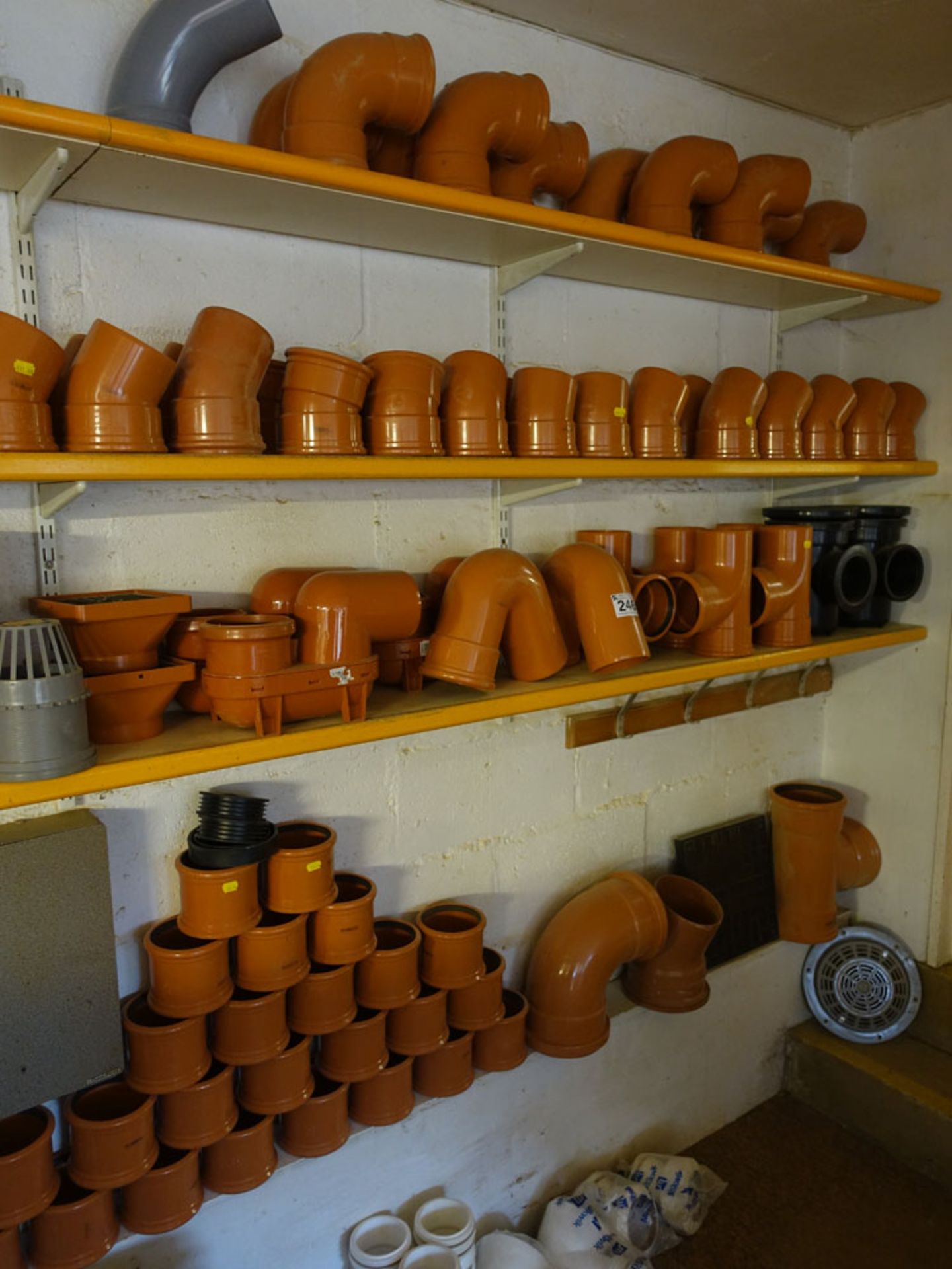 Range of mainly 4'' plastic soil pipe fittings