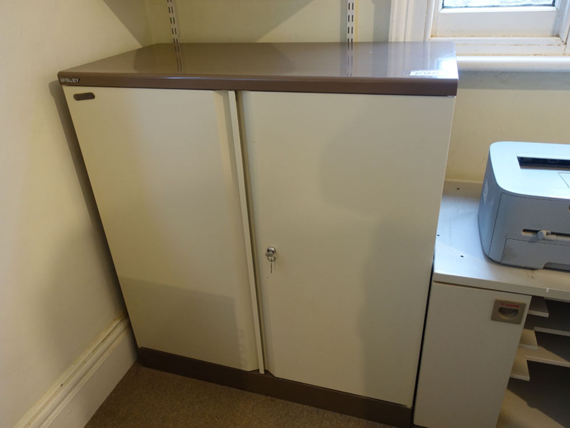 Bisley double door stationery cupboard and a grey steel 4 drawer filing cabinet