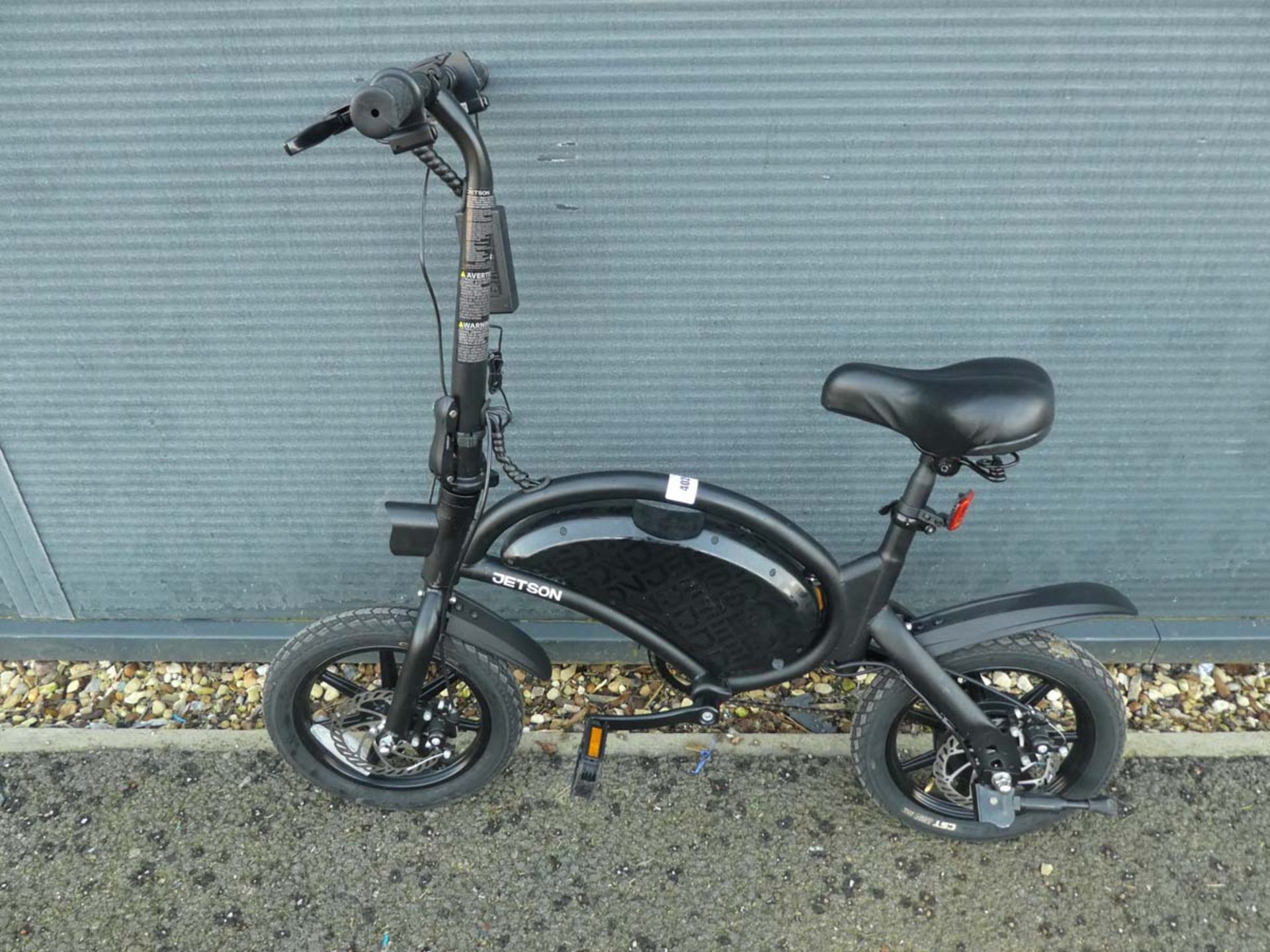 Black Jetson Bolt electric bike with pedals and charger