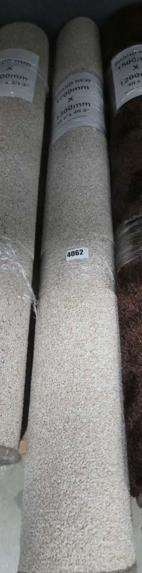 700mm x 1300mm beige rug