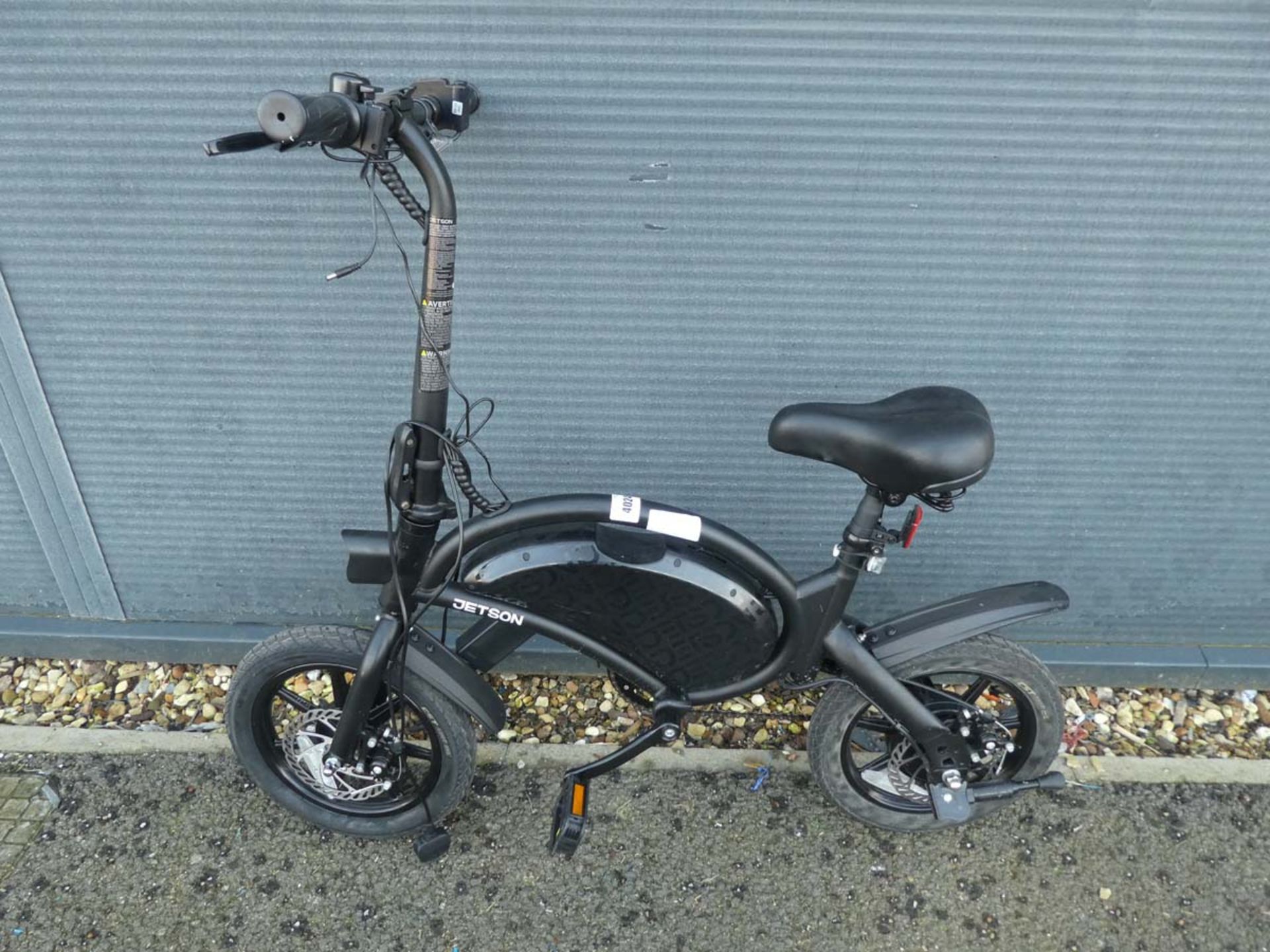 Black Jetson Bolt electric bike with pedals and charger
