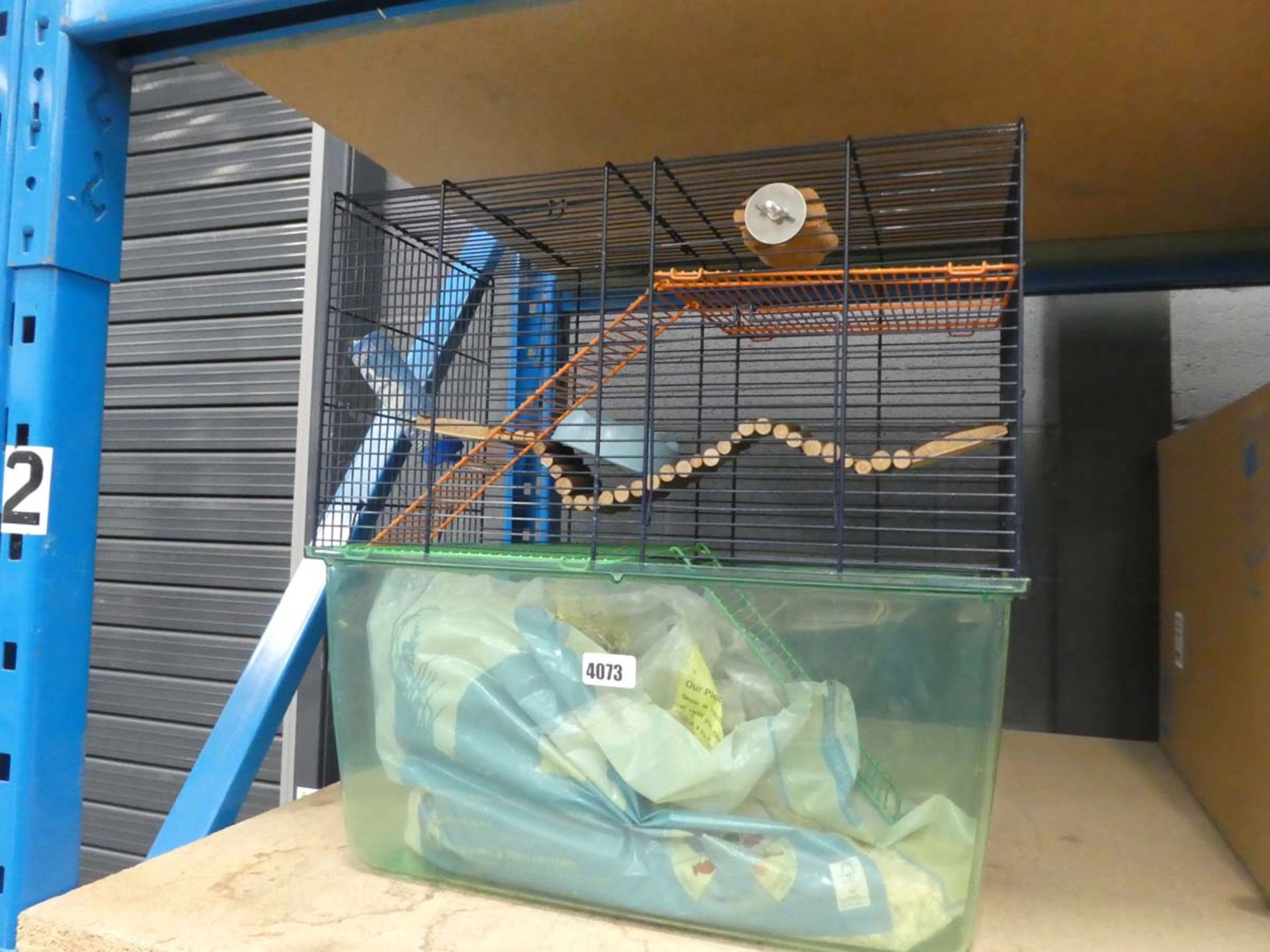 Gerbil cage complete with accessories to include water bottle, feeding bowl and wood shavings