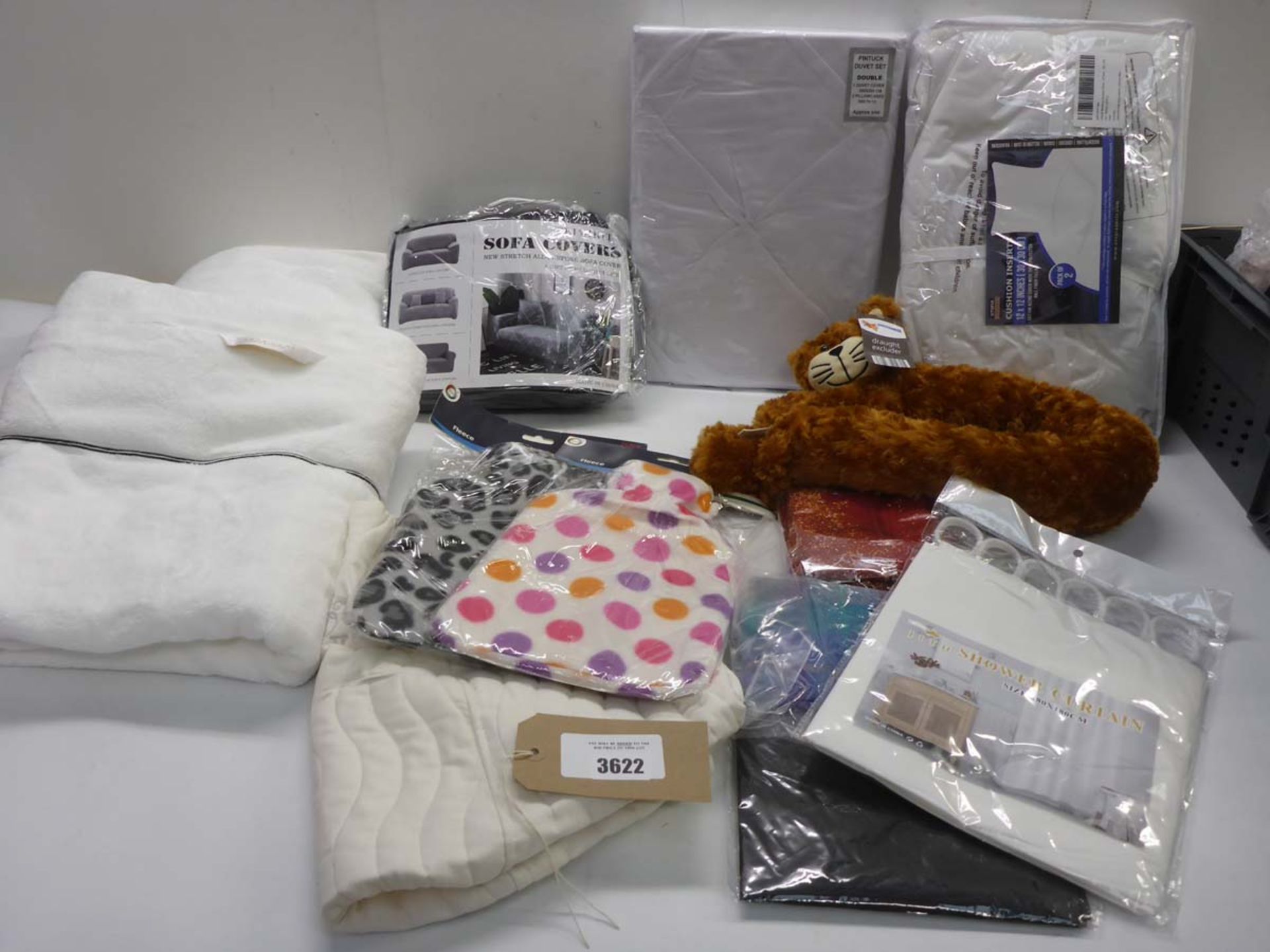 Double duvet set, square cushion, bath sheets, sofa cover, hot water bottles, draught excluder,