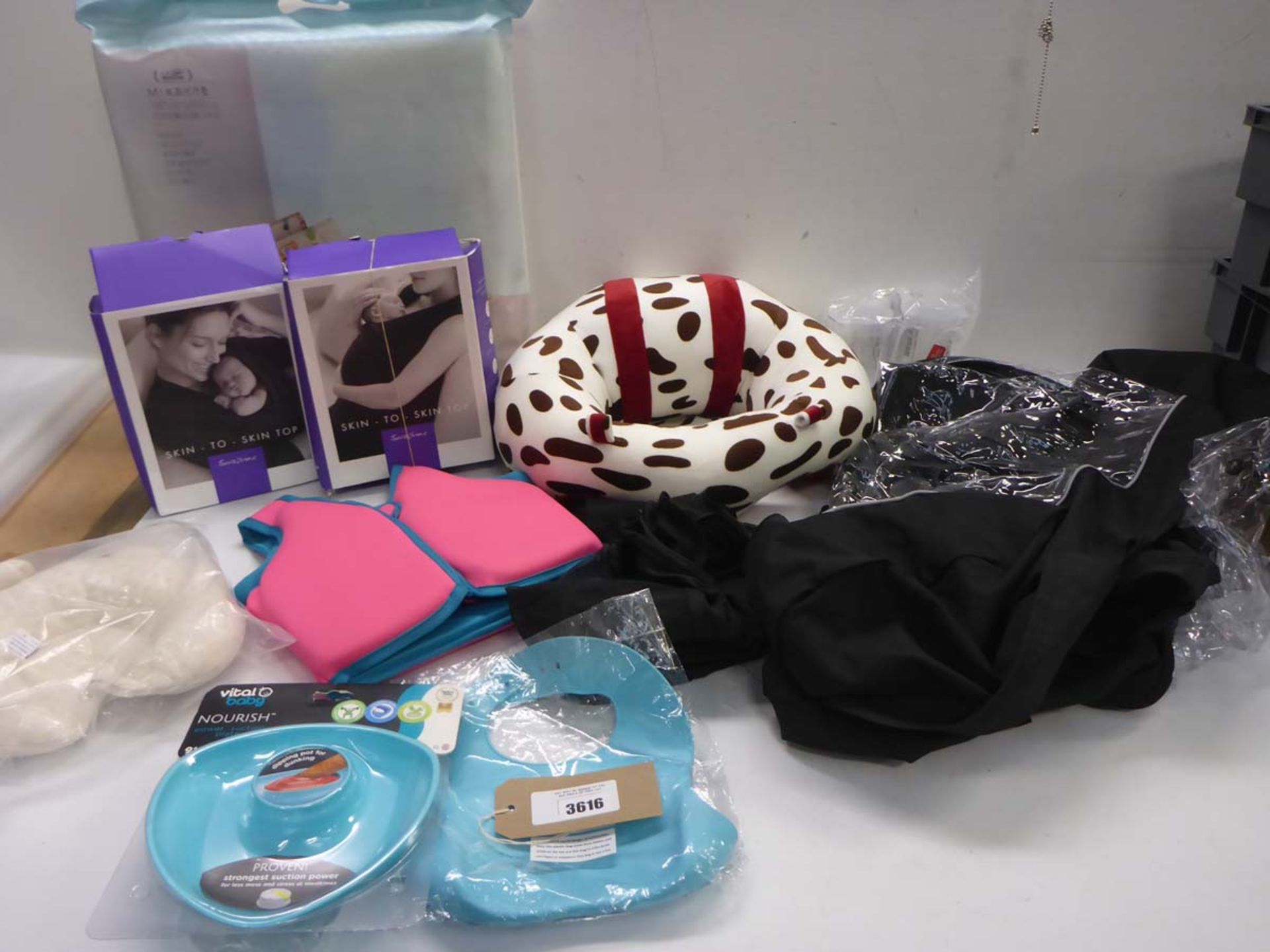 Skin to skin baby wraps, child's floatation vest, suction plate, bib, buggy covers, play mat, sit