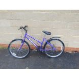 (2211) Purple Raleigh youth mountain bike