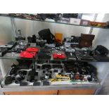 2 shelves of assorted film cameras