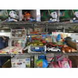 Shelf of Squishmallows, Curious Science games, scale model cars and other toys