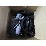 Black Nintendo Wii console with various accessories