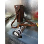 Military exposure meter with brown leather case