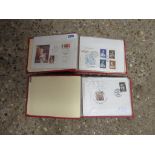 2 albums containing assorted stamps, etc.