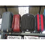 4 assorted luggage cases