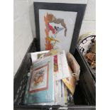 Crate of needlework, patterns, craft kits, etc.