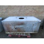 Large galvanized tank with rivited edging