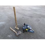 Petrol chainsaw with sledgehammer and axe