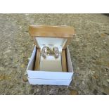 Pair of foreign yellow metal earrings with box