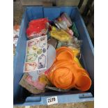 Crate of childrens molds, stickers, etc.