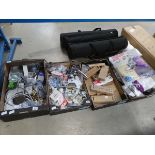 4 boxes of plumbing equipment incl. shower heads, hoses, valves, radiator connectors, etc.