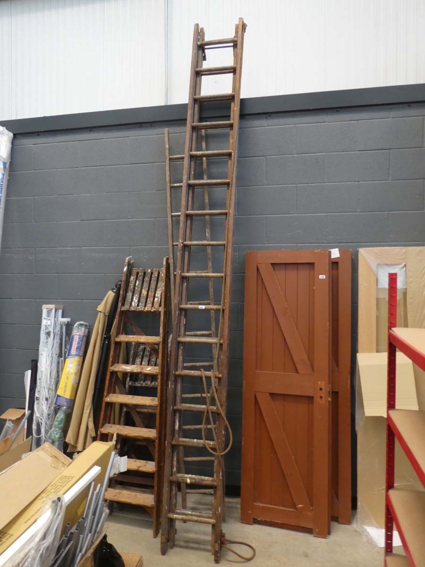 2 wooden ladders and 2 wooden stepladders