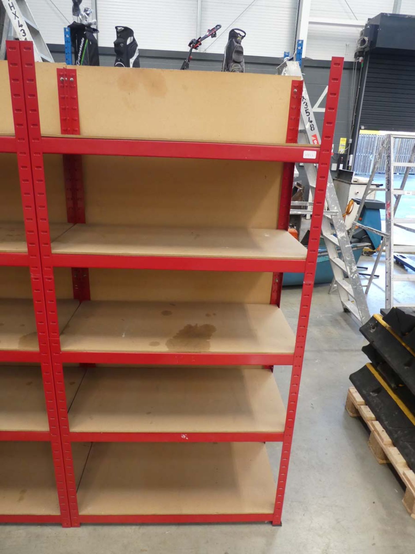 Red metal 5-shelf rack