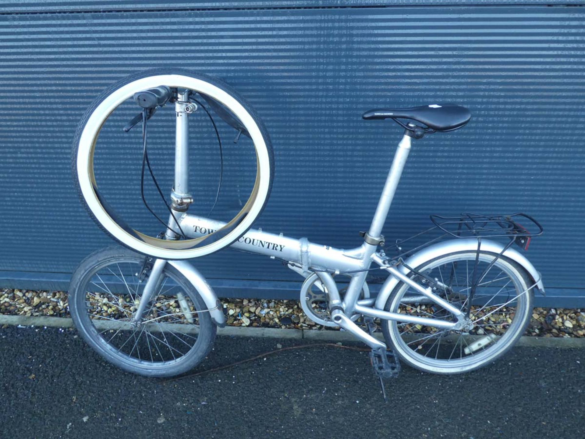 Town and Country fold up bike with spare tyre