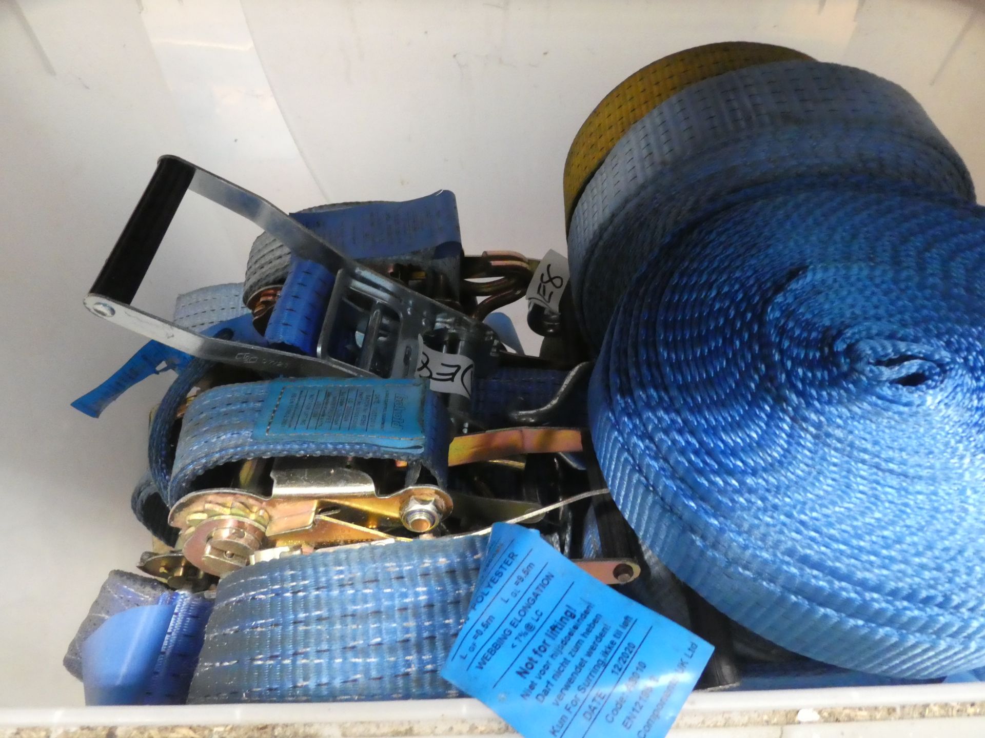 Box of blue used lorry straps
