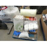 Pallet containing trampoline parts, hessian bags, paper, foam, mortar mix, tape, clay etc.