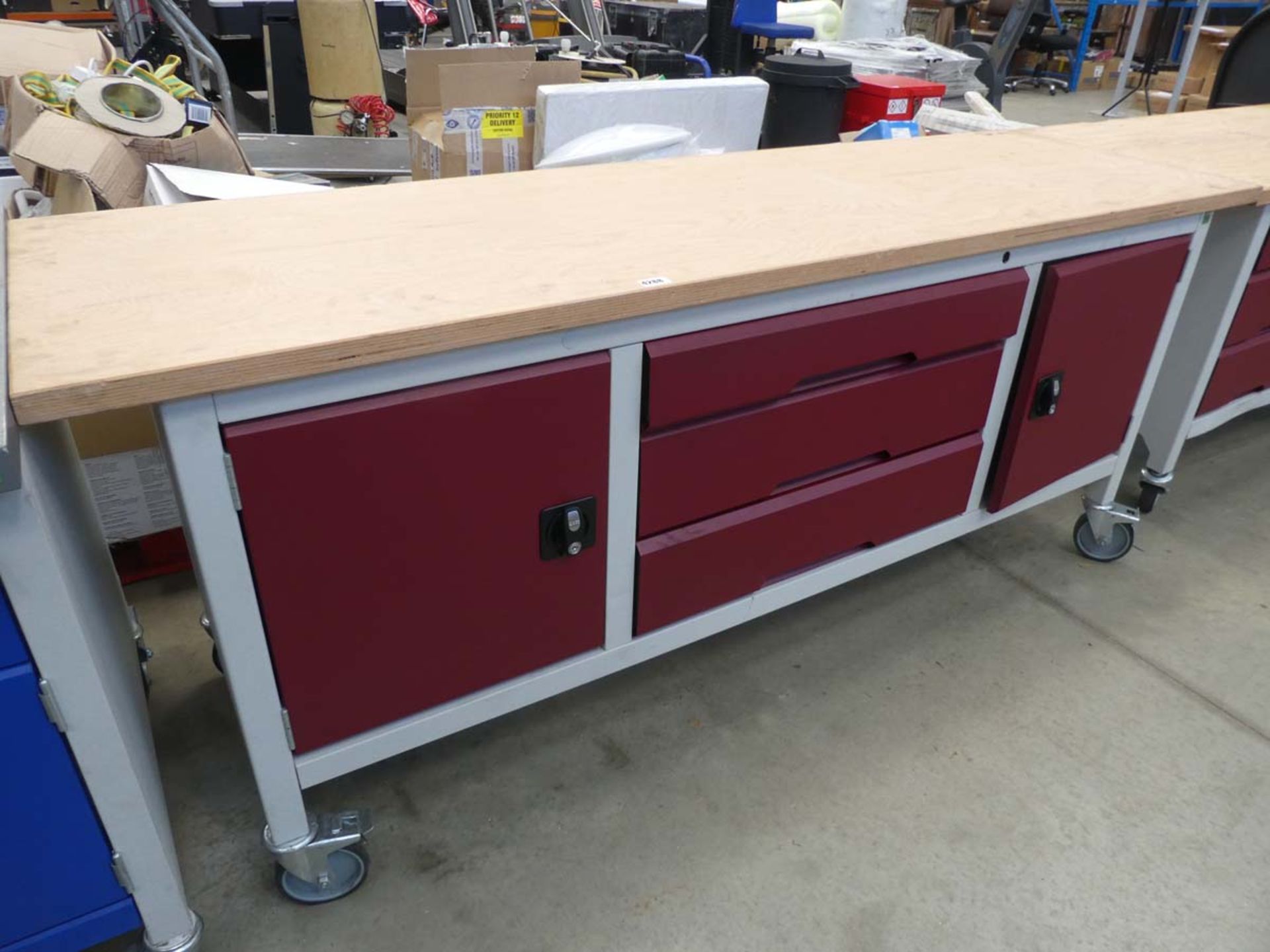 6ft long wheeled work station with cupboards and drawers under