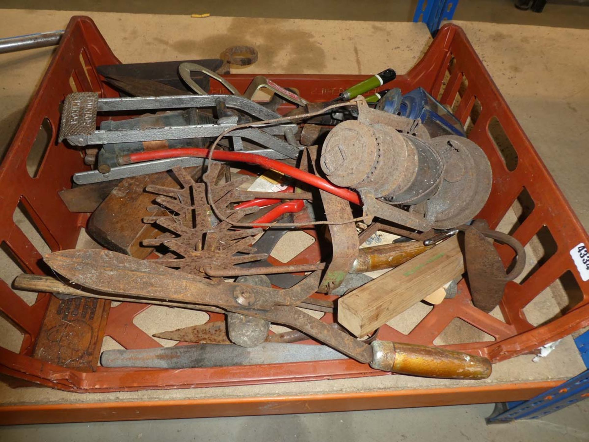Crate of vintage tools, lamps, foot pumps etc.