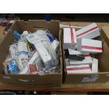 Box of extension cables and box of decoy cameras and door alarms