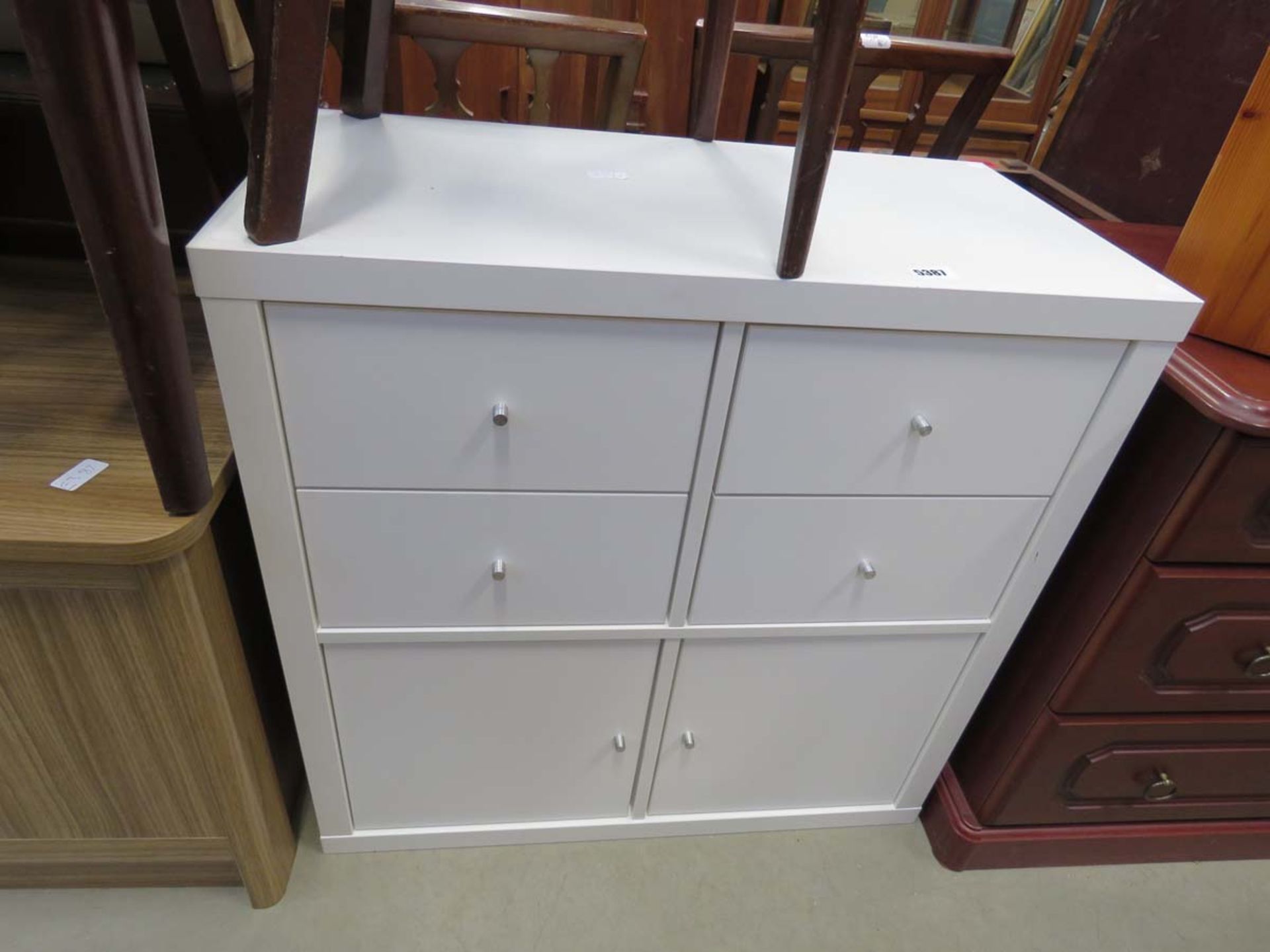 White painted contemporary chest of 4 drawers with cupboard under