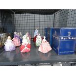 Cage containing a quantity of Royal Doulton and other lady figures