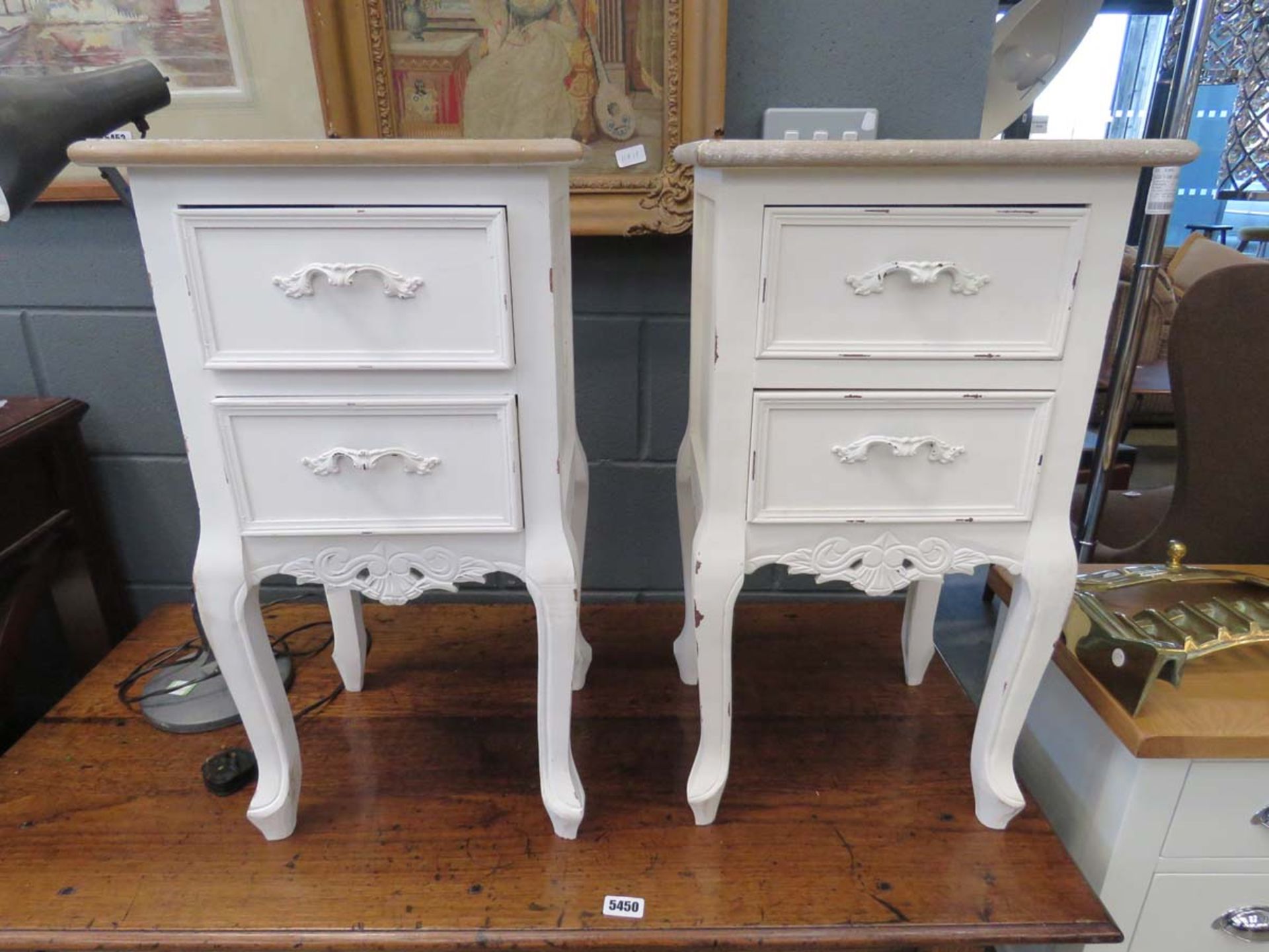 Pair of cream painted two drawer bedside cabinets