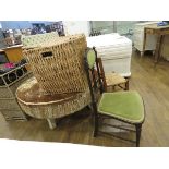 Hide woven drum table, wicker linen basket, wicker topped small chair, green upholstered hall