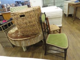 Hide woven drum table, wicker linen basket, wicker topped small chair, green upholstered hall
