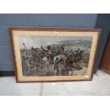 Framed and glazed battle scene with cavalrymen