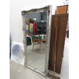 Rectangular beveled mirror in silver frame