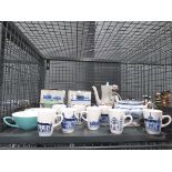 Cage containing Dutch blue and white coffee mugs, various crockery and figures