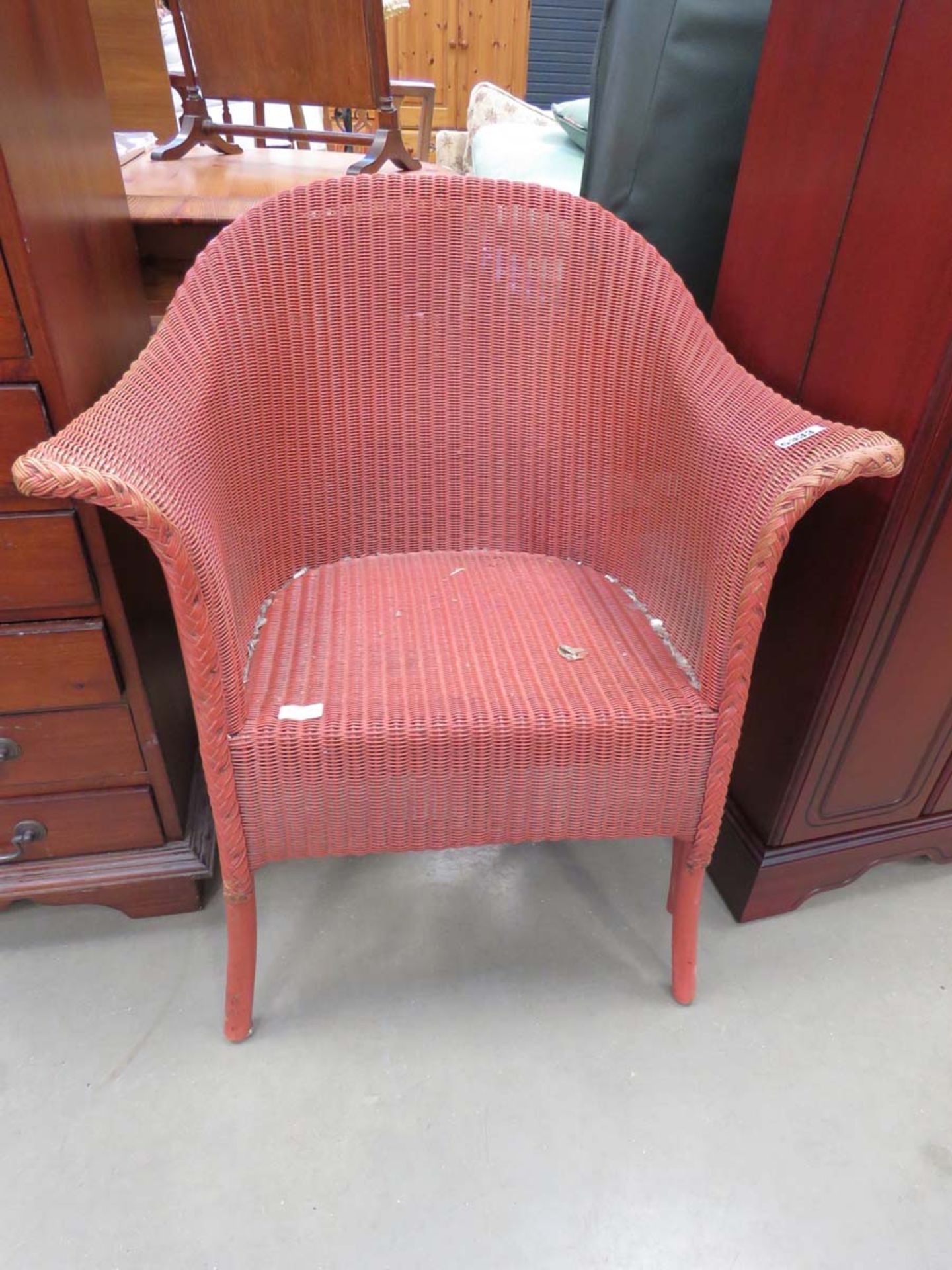 Red painted Lloyd loom style arm chair