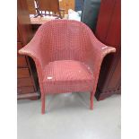 Red painted Lloyd loom style arm chair