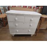 White painted 2 over 2 chest of drawers